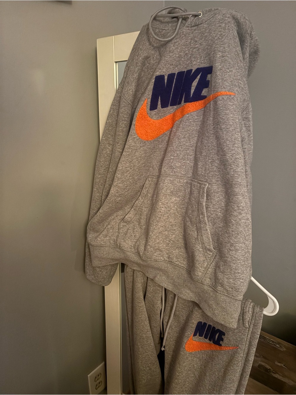 Nike Grey Crewneck Sweatshirt with Orange Swoosh and Navy Logo